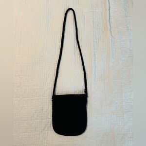 Enzo Angiolini black knit crossbody bag.
